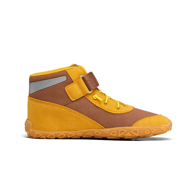 Gulbrun børnesneaker vist fra indersiden med tynd sål