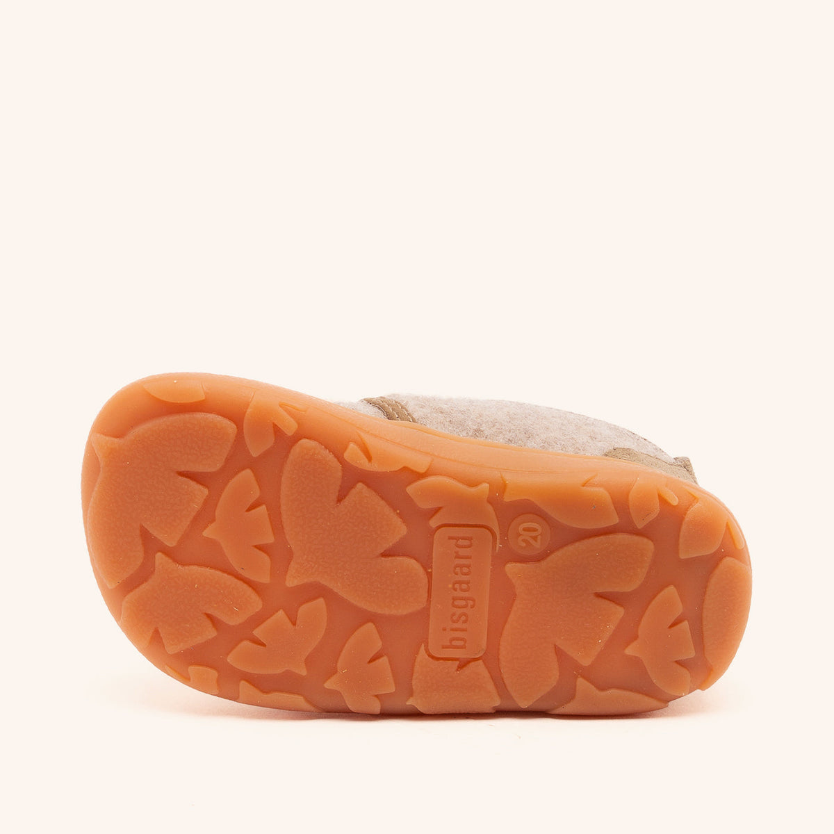 Ydersål i karamelfarvet gummi med mønster af fugle set nedefra