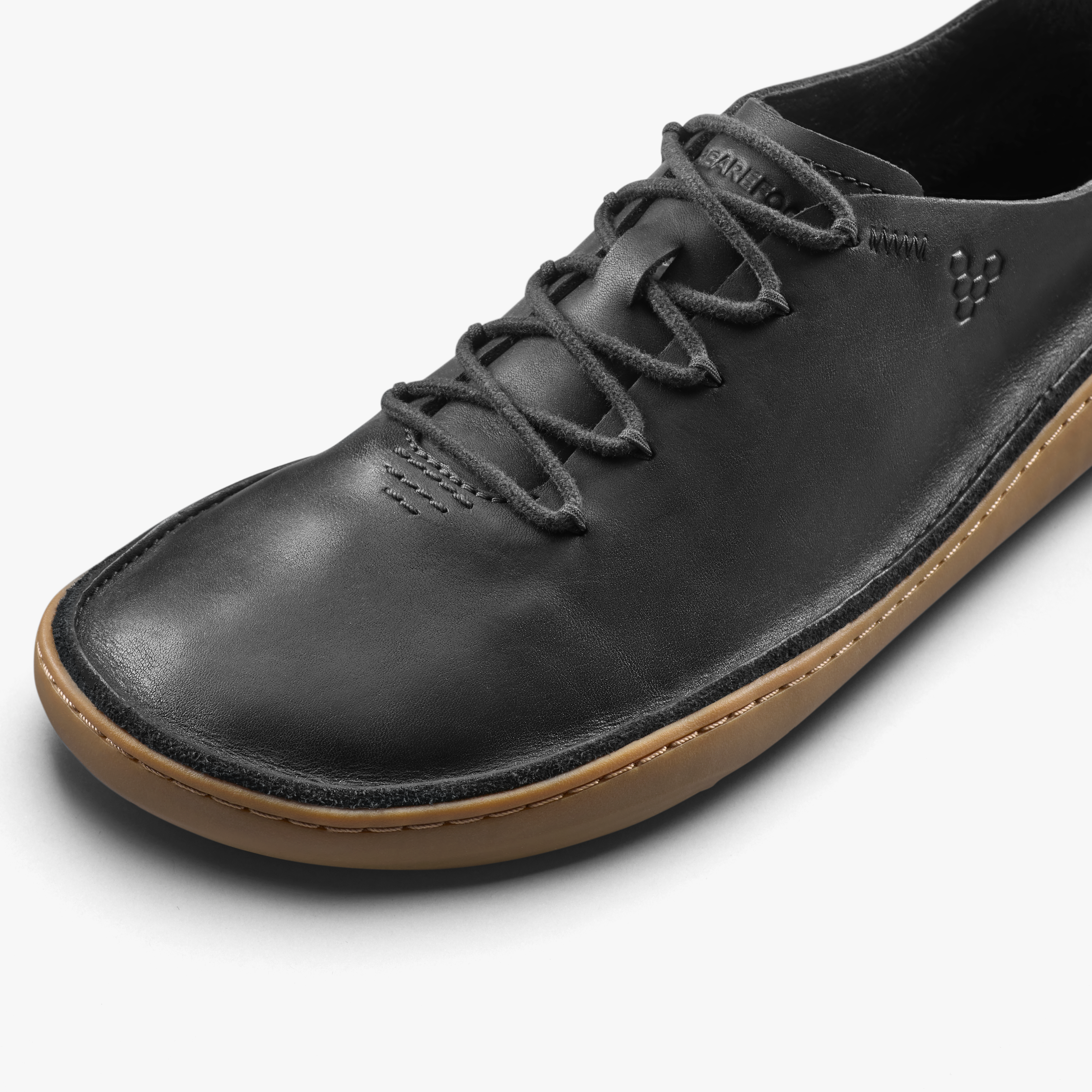 Vivobarefoot Sensus Moc Lace Up Leather Mens Eclipse, nærbillede af materiale