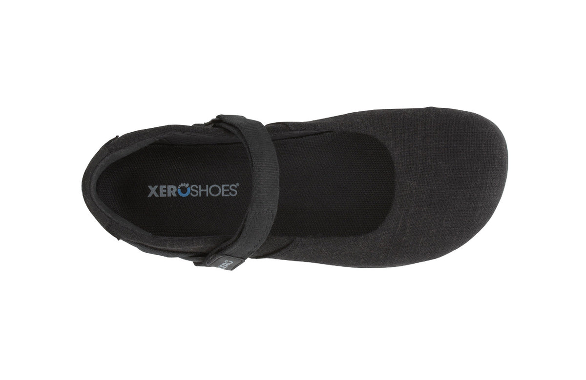 Sort flad sko set oppefra med Xero Shoes-indlægssål