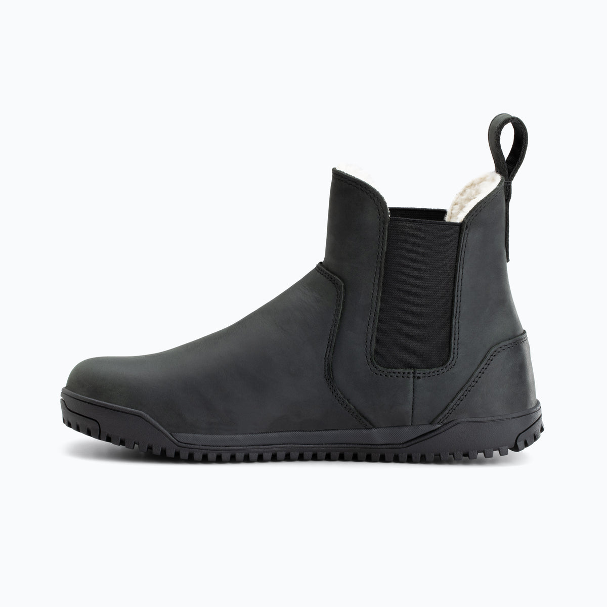 Sort chelsea-støvle fra indersiden med elastisk sidepanel og lys foring