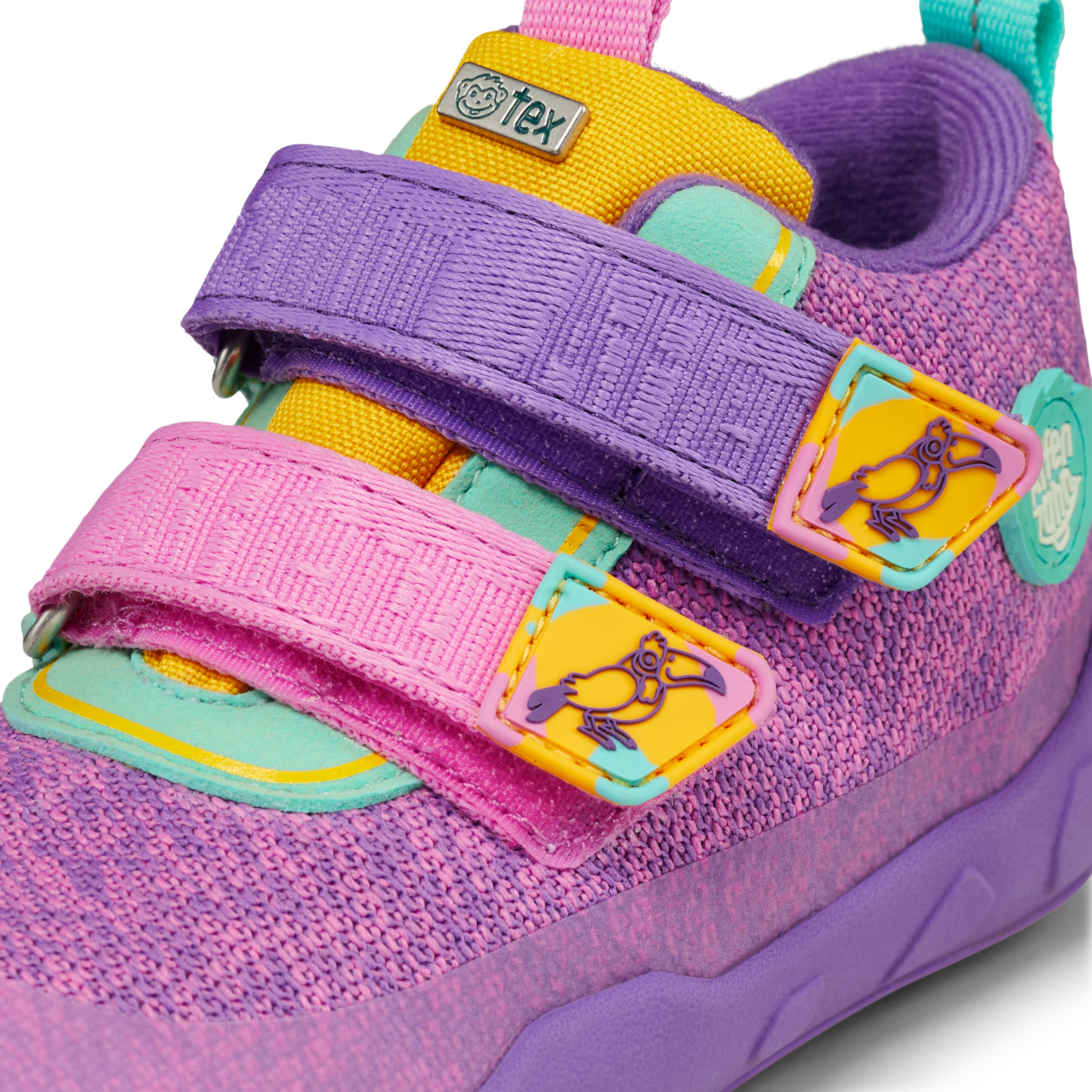 Affenzahn Lowboot Knit Happy Creative Toucan for kids in pink and purple knit fabric, featuring two Velcro straps with toucan illustrations, barefoot shoe design.