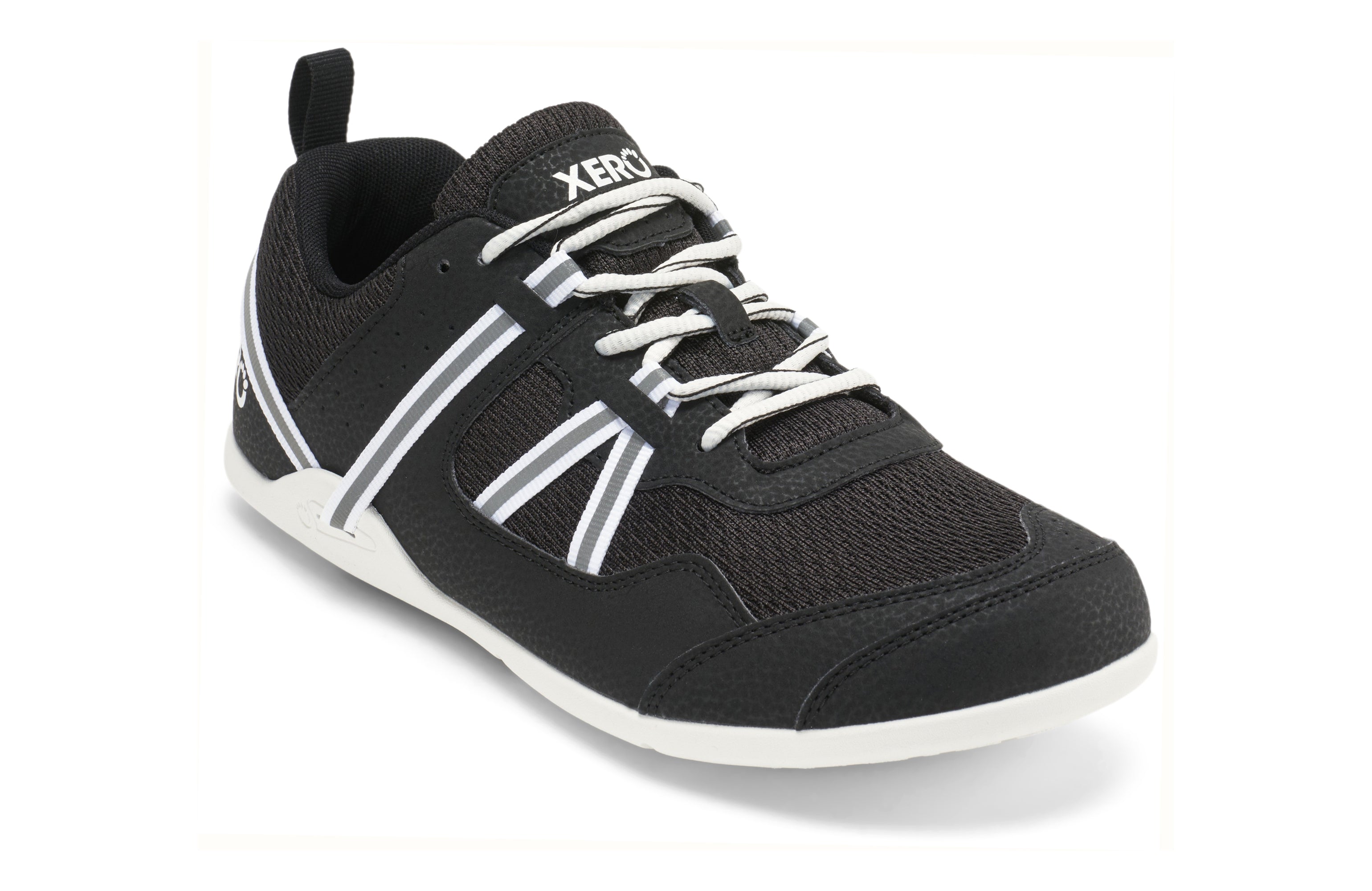 Xero Shoes Prio Men, Black/White variant, sneaker with black mesh upper, white reflective straps, and white laces. Designed for natural foot movement with a minimalist rubber sole.